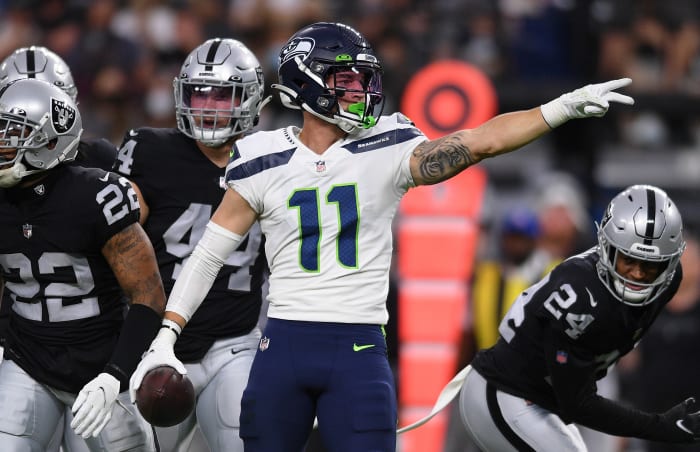 Seattle Seahawks wide receiver Cody Thompson (11) reacts after a first down against the Las Vegas Raiders during the first quarter at Allegiant Stadium.